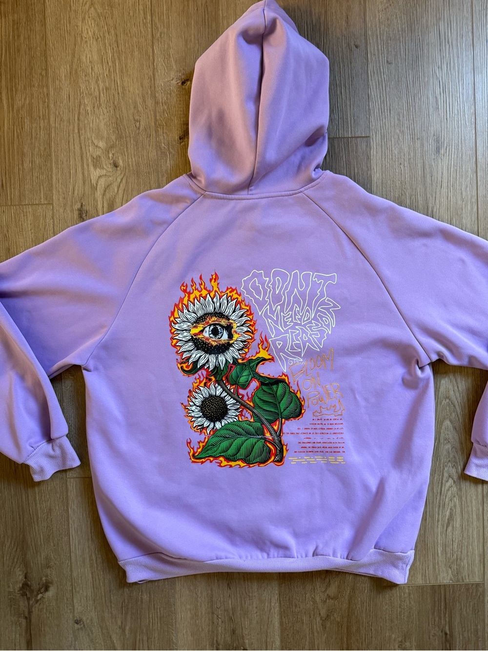 Lavender “Don’t Need a Reason” Sunflower Eye Graphic Hoodie Size L unisex NWOT